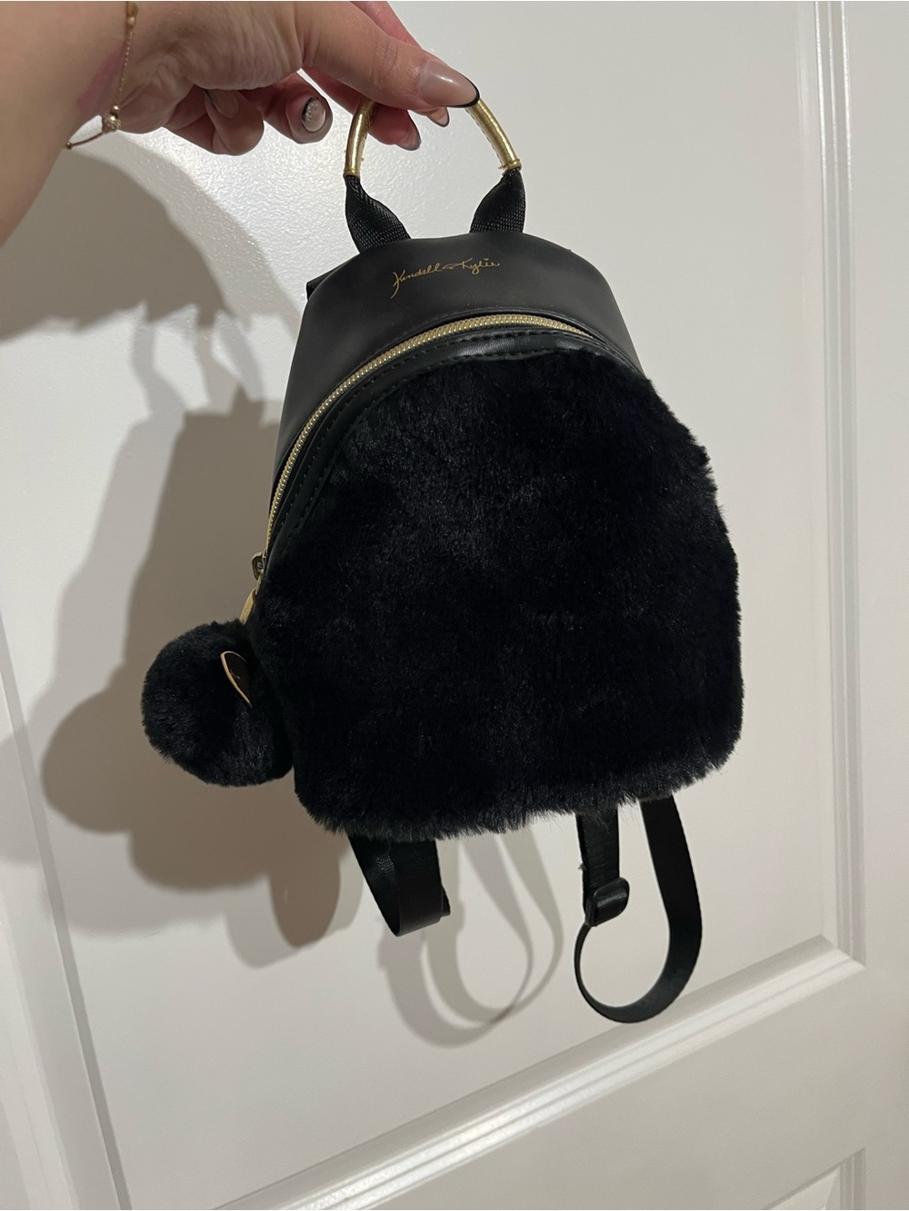Kendall + Kylie Black Faux Fur Mini Backpack with Pom Pom
